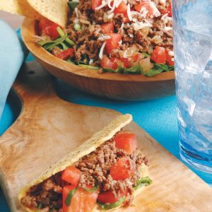 Taco Salad with Shells on Blue Tablecloth Food Picture