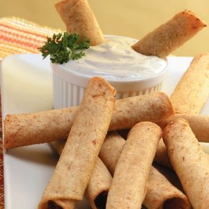 Taquitos on White Plate with Dipping Sauce Food Picture