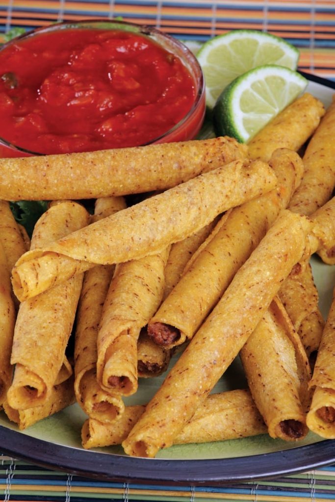Taquitos on Plate with Dipping Sauce Food Picture