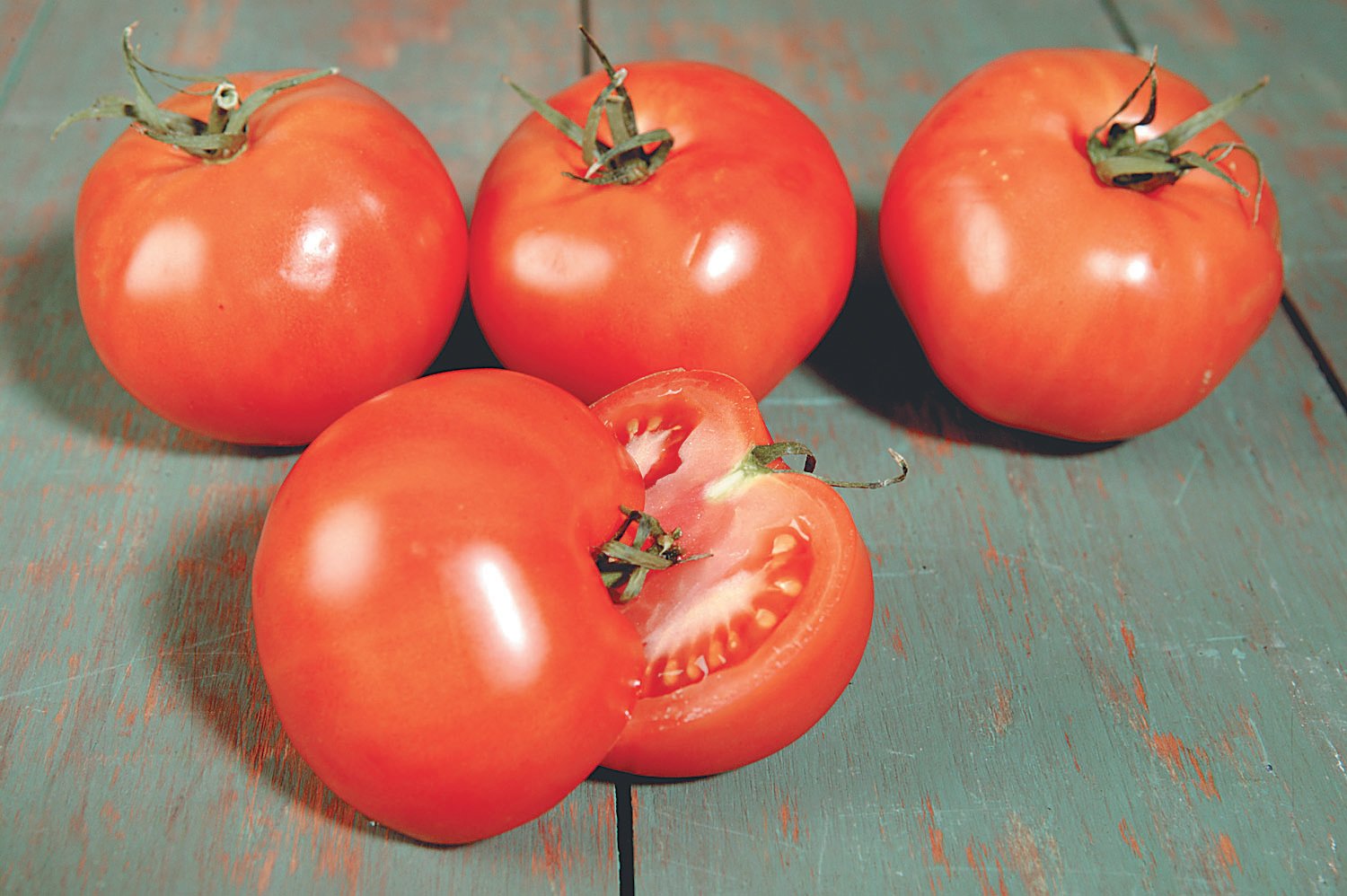 Tomatoes on Green Wooden Surface Food Picture