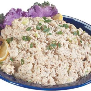 Tuna salad over tomato and lettuce on clear plate with white background Food Picture