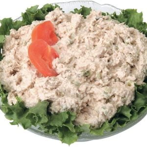 Tuna salad in yellow pepper with rice in white bowl with green background Food Picture