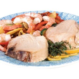 Tuna steak with shrimp and garnish on blue and white plate Food Picture
