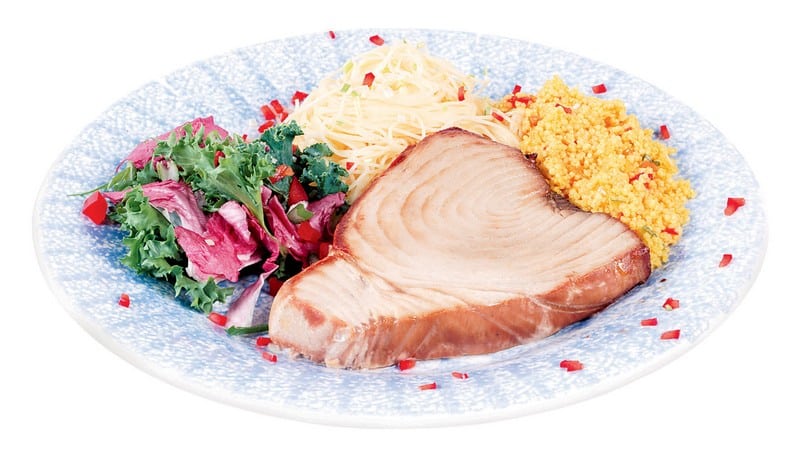 Yellowfin tuna on multicolored plate with salad, rice, and noodles Food Picture