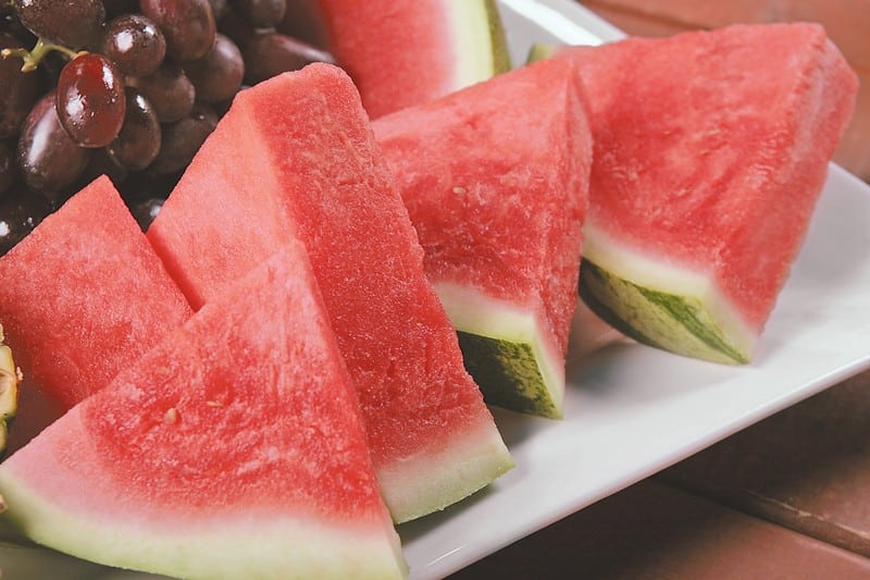 Freshly Sliced Seedless Watermelon on Plate Food Picture
